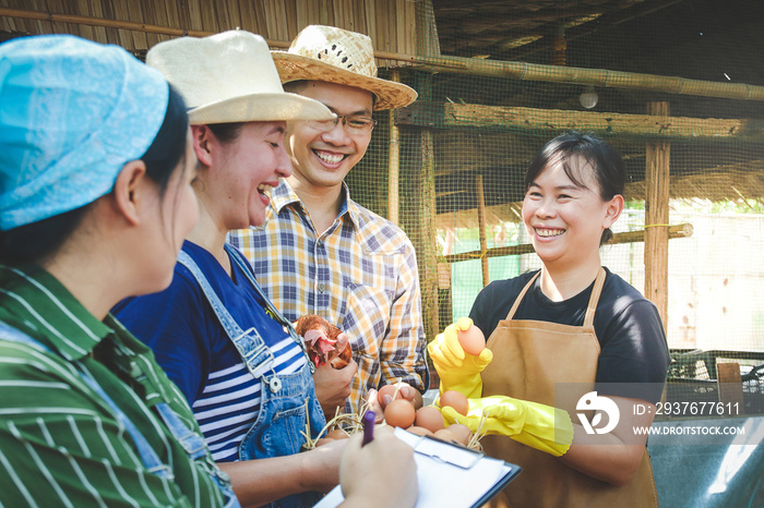 Asian farmers group working together to make organic chicken egg farms without chemicals that are go