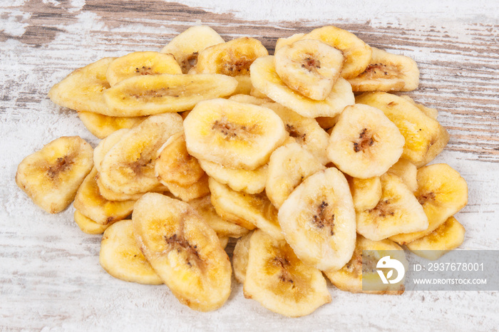 Homemade dried chips of banana for snack or dessert