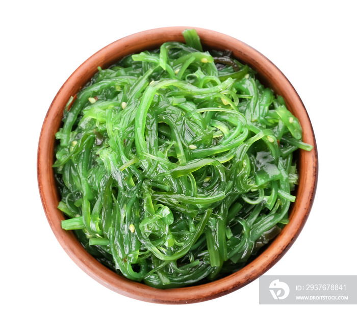 Bowl with tasty seaweed salad on white background