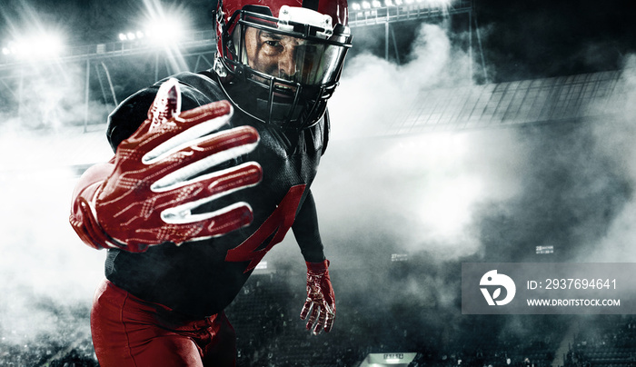美国足球运动员，戴着红色头盔的运动员，深色背景，烟雾弥漫。运动与运动