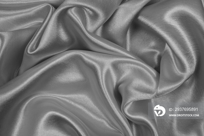 Black silk texture luxurious satin for abstract background