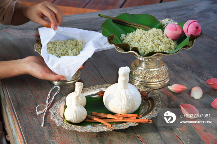 Preparation of an herbal compress to be applied on the body Thailand