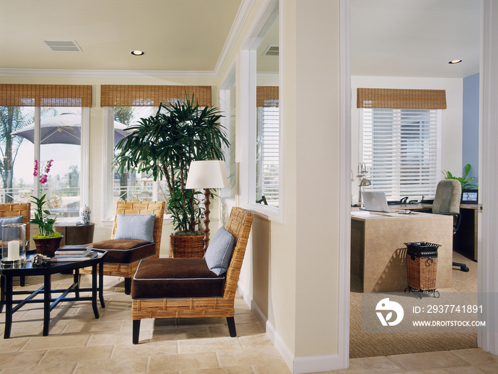 Living room and home office in middle class house; Oxnard; California; USA