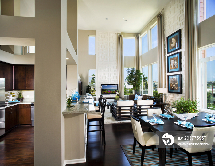 View of dining area and living room in modern house