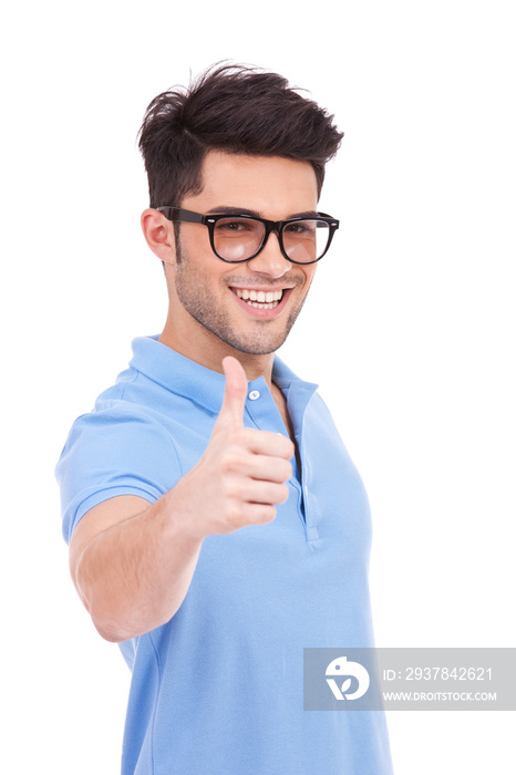 young man holding thumbs up